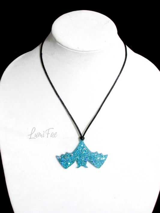 Sparkly Blue Upside-down Hanging Bat Necklace, glitter, aqua, turquoise, pendant, resin, cord, adjustable