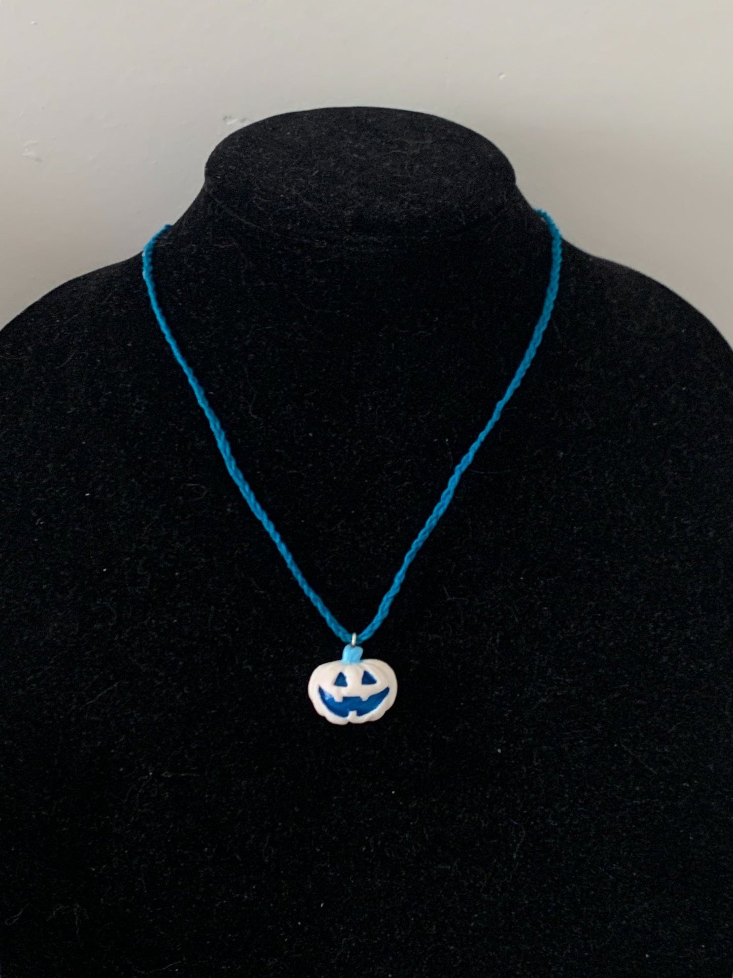 Frosted Winter Jack-O-Lantern Necklace, White Pumpkin, Blue Cotton Cord - LumiFae