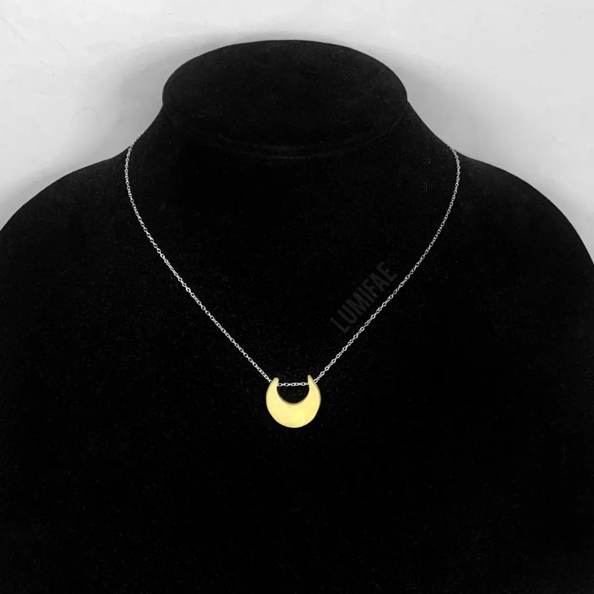 Glow-in-the-Dark Mini Crescent Moon Necklace on delicate chain